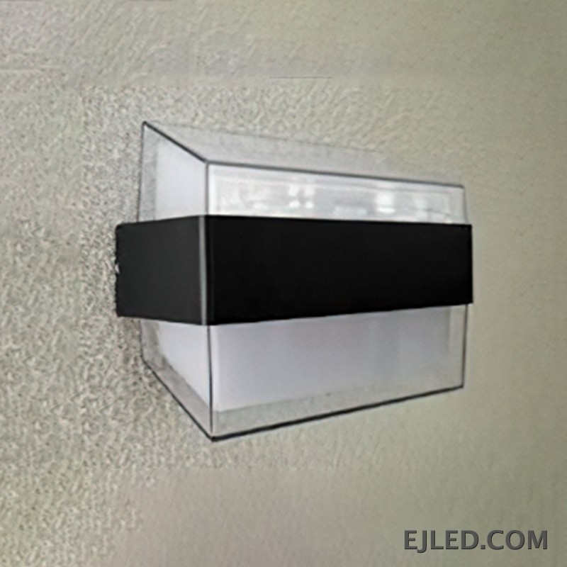 The WL0009 is an acrylic wall light featuring a clear outer casing, a white diffuser, and a distinctive black mid-band. Its angled profile provides diffused illumination. - view 2