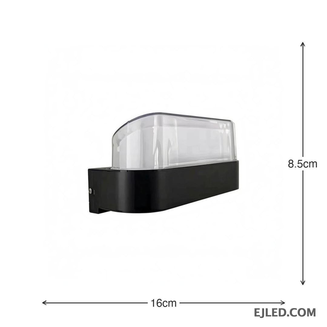 Esta lámpara de pared presenta un cuerpo rectangular de plástico con base negra y un difusor curvo de plástico transparente. Está diseñada para montaje en pared y proporciona iluminación cerrada. - view 4