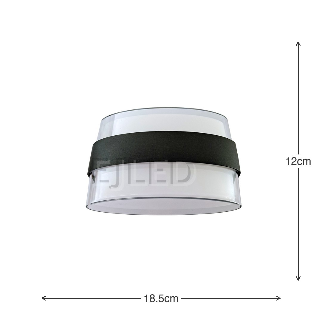 This wall light features a clear acrylic outer layer surrounding a white acrylic diffuser. A distinctive black band wraps around the middle, providing a modern and clean aesthetic for various interior settings. - view 5