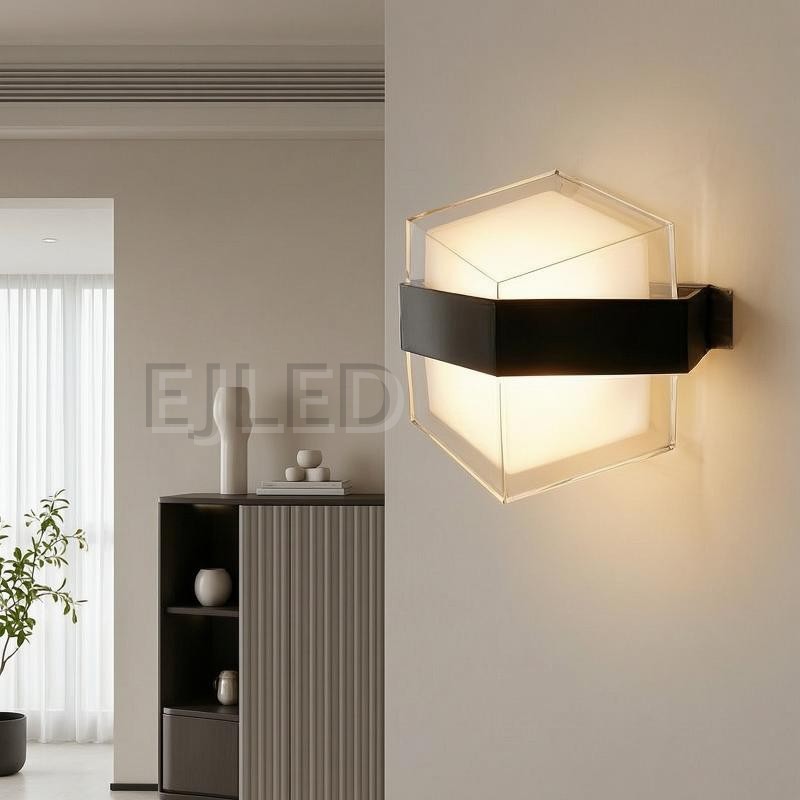 This hexagonal acrylic wall light features a clear outer shade, a white internal diffuser, and a distinct dark band around its middle. It provides enclosed illumination from a wall-mounted fixture. - view 6