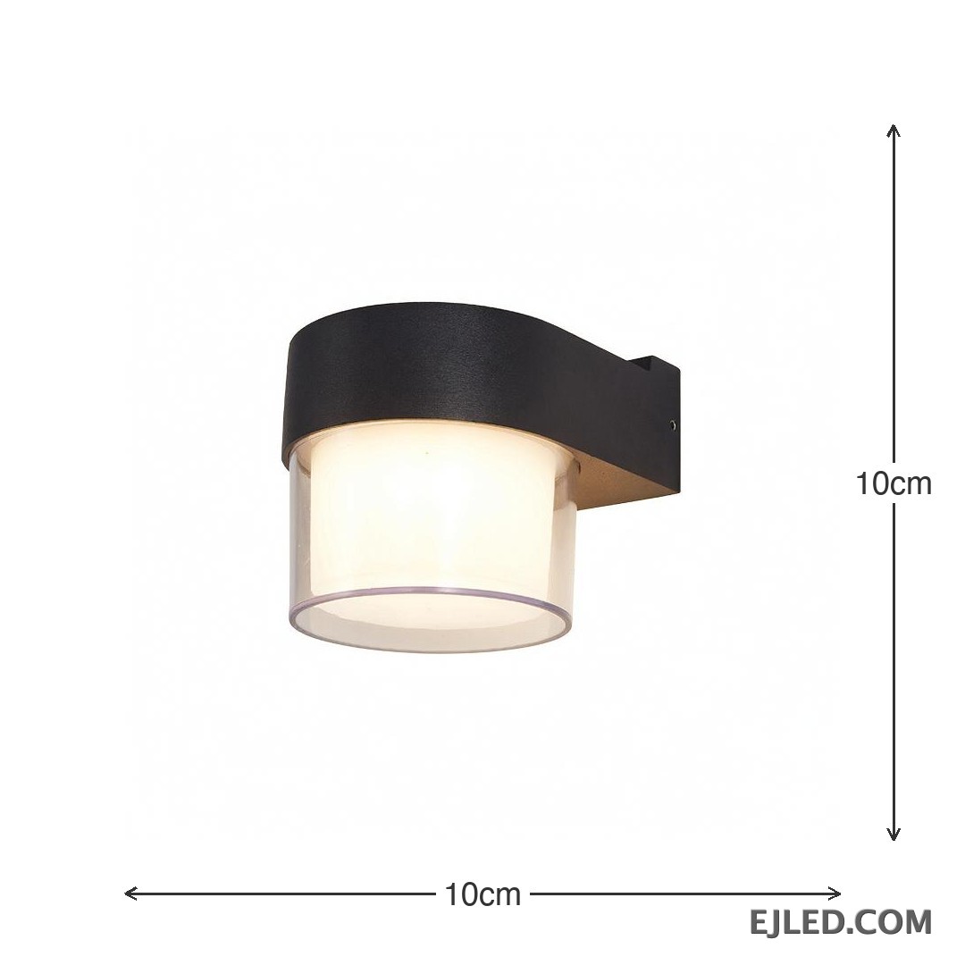 This wall lamp features a textured black plastic body with a curved arm, enclosing a cylindrical light source. It has an inner frosted diffuser and an outer clear enclosure for emitted light. - view 5