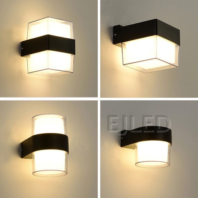 This compact square wall light features a durable black plastic body with a clear outer protective frame enclosing an inner white diffuser. - view 4