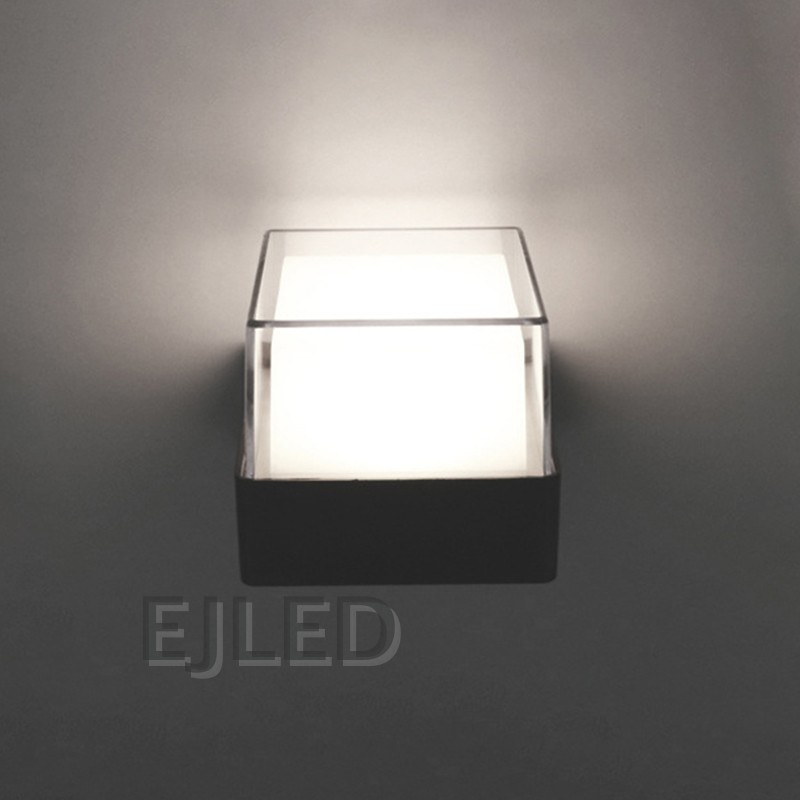 This compact square wall light features a durable black plastic body with a clear outer protective frame enclosing an inner white diffuser. - view 5