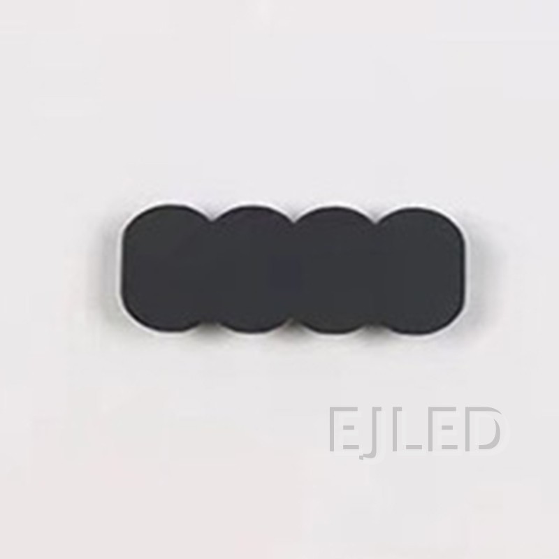This black aluminum wall light features a distinctive three-circle shade design and mounts securely to vertical surfaces for project applications. Model WL0036. - view 3