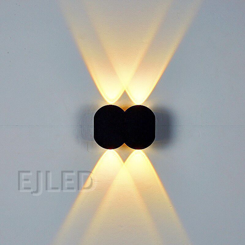 This black aluminum wall light features a distinctive three-circle shade design and mounts securely to vertical surfaces for project applications. Model WL0036. - view 5