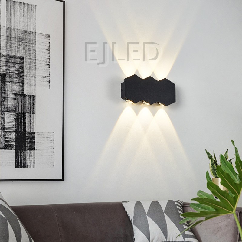 This black aluminum wall light features a distinctive three-circle shade design and mounts securely to vertical surfaces for project applications. Model WL0036. - view 6