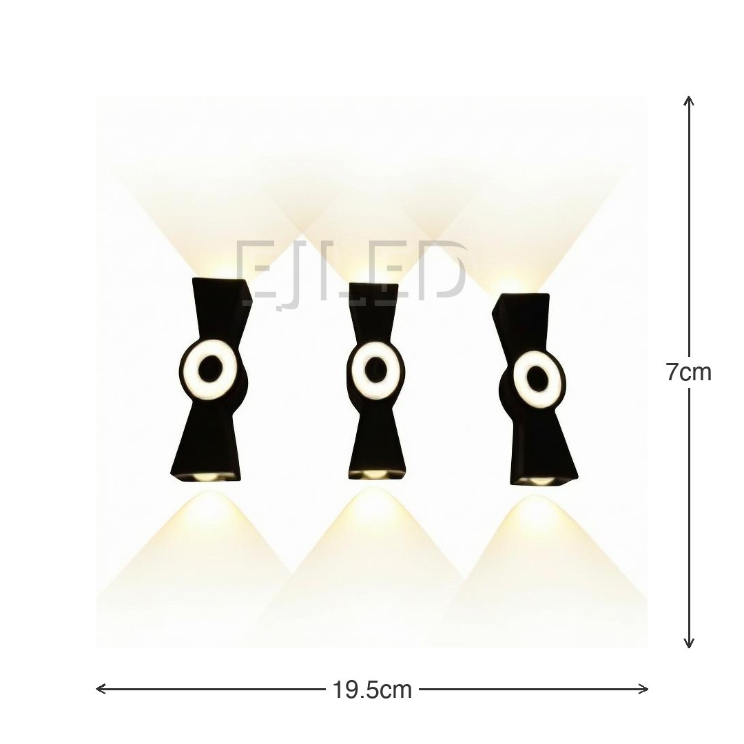This black plastic wall light features a dual-directional beam design with integrated circular light elements and open top and bottom openings. - view 3