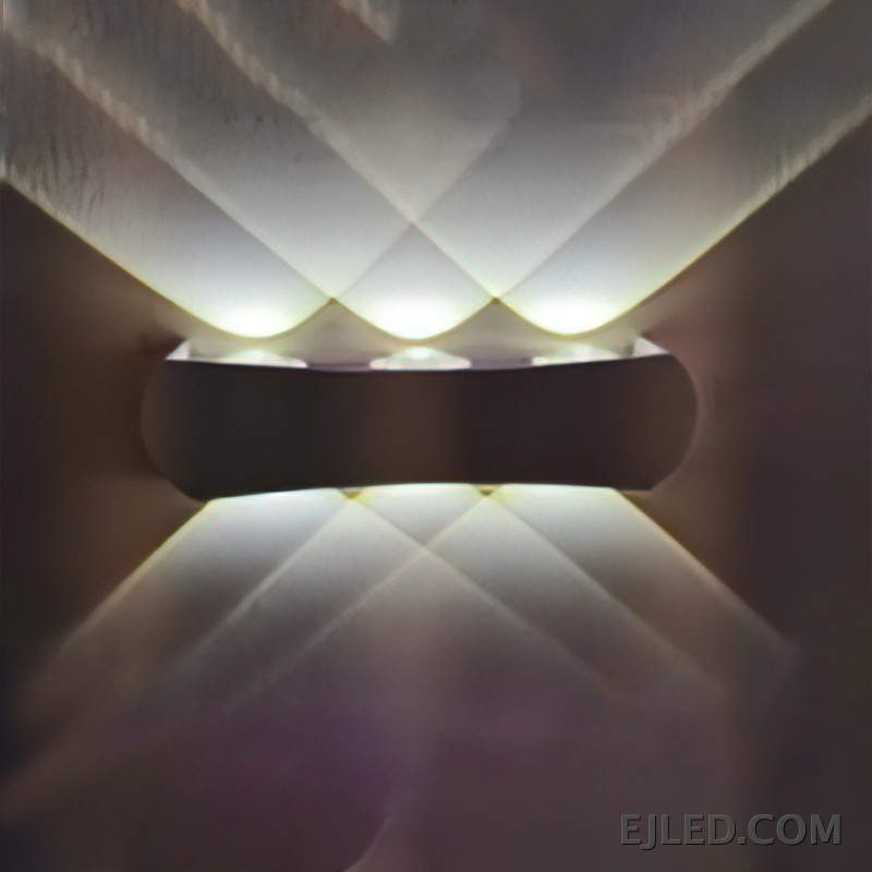 Plastic construction defines the WL0050, a rectangular black wall light designed for focused up-and-down illumination. It provides a distinct light pattern, suitable for architectural emphasis or accent lighting in various settings. - view 2