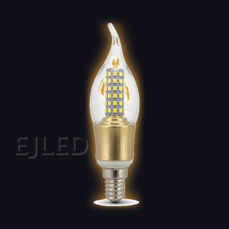 This clear flame tip LED bulb features multiple surface mounted diodes on a central pillar, a gold colored lower body, and a standard screw base for commercial fittings. - view 2